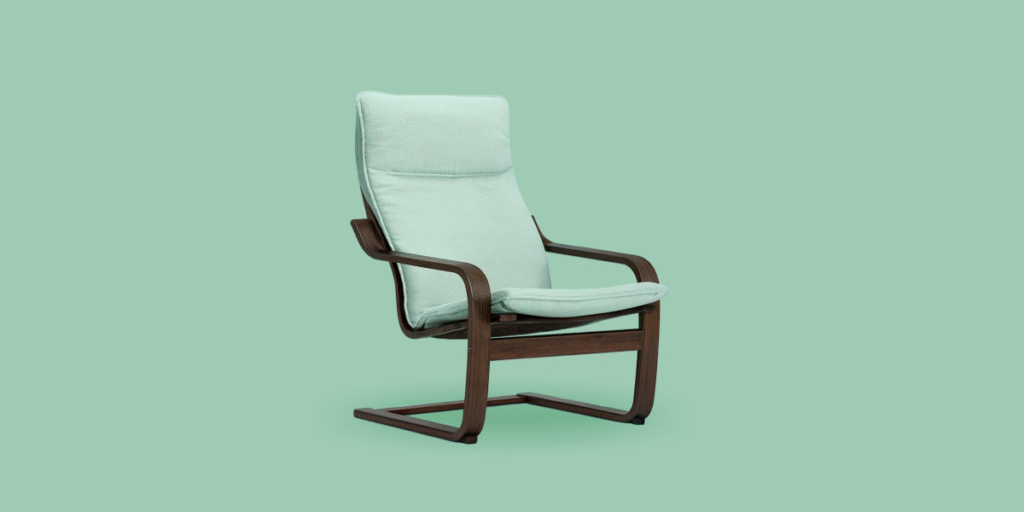 IKEA Poäng armchair with bentwood frame and mint cushion, a modern classic inspired by Bauhaus simplicity.