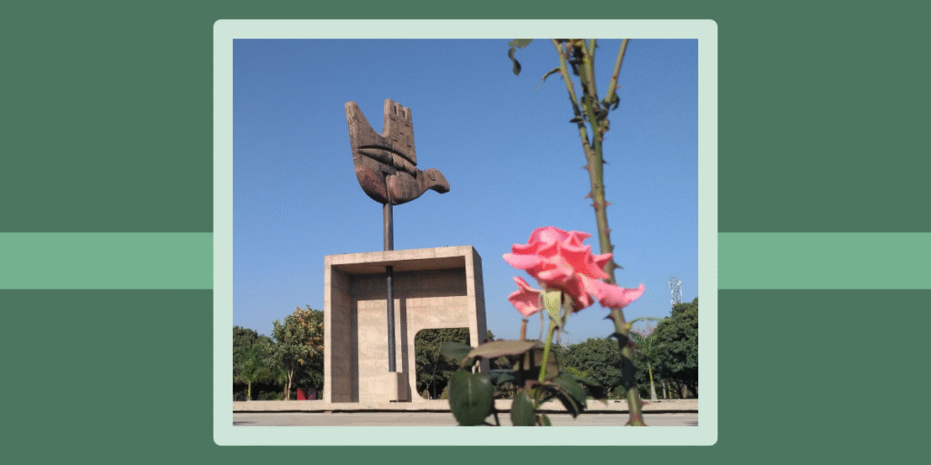 The Open Hand Monument in Chandigarh, a large metal sculpture designed by Le Corbusier, rotating with the wind.
