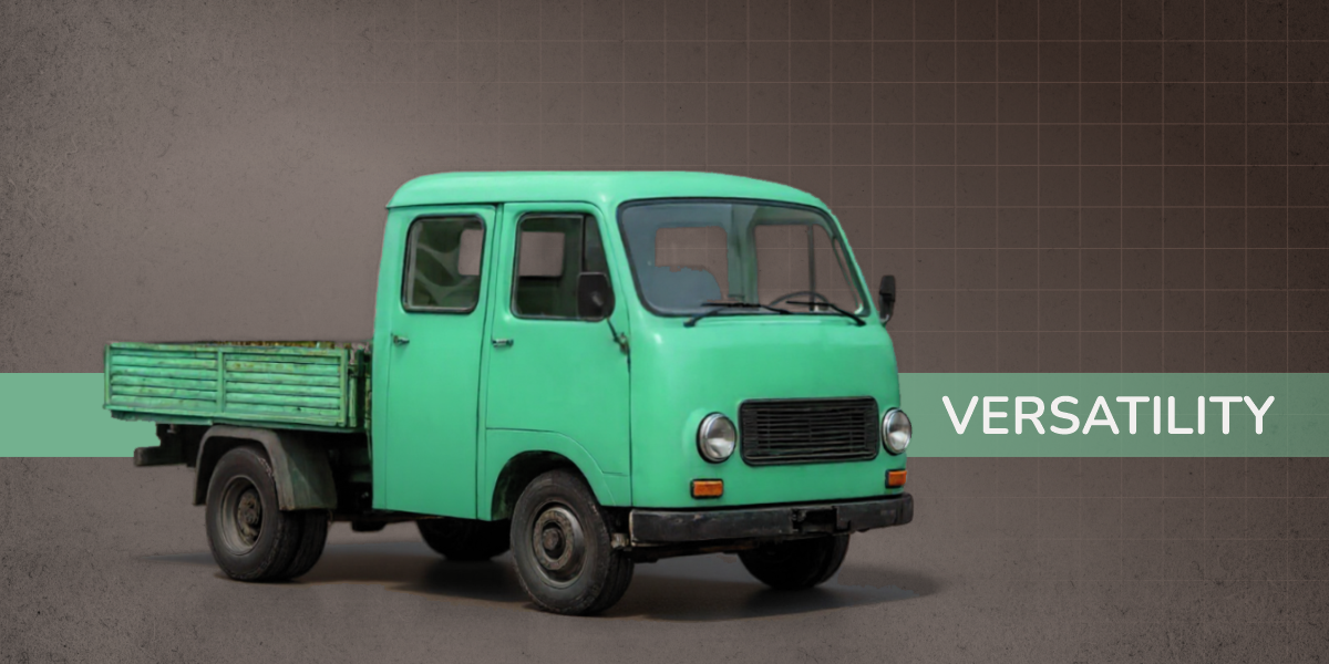 A light green Tamič truck with a double cab and flatbed, photographed on a gray street, highlighting the vehicle's versatility. The word "VERSATILITY" is featured prominently on the right